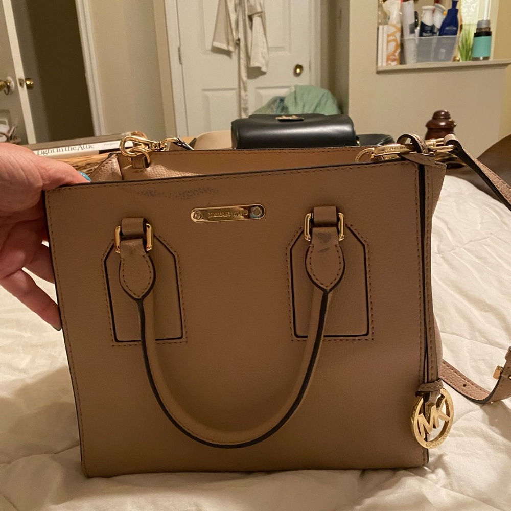 Pink. Used. Small buff mark on front of bag noted in picture and back small mark